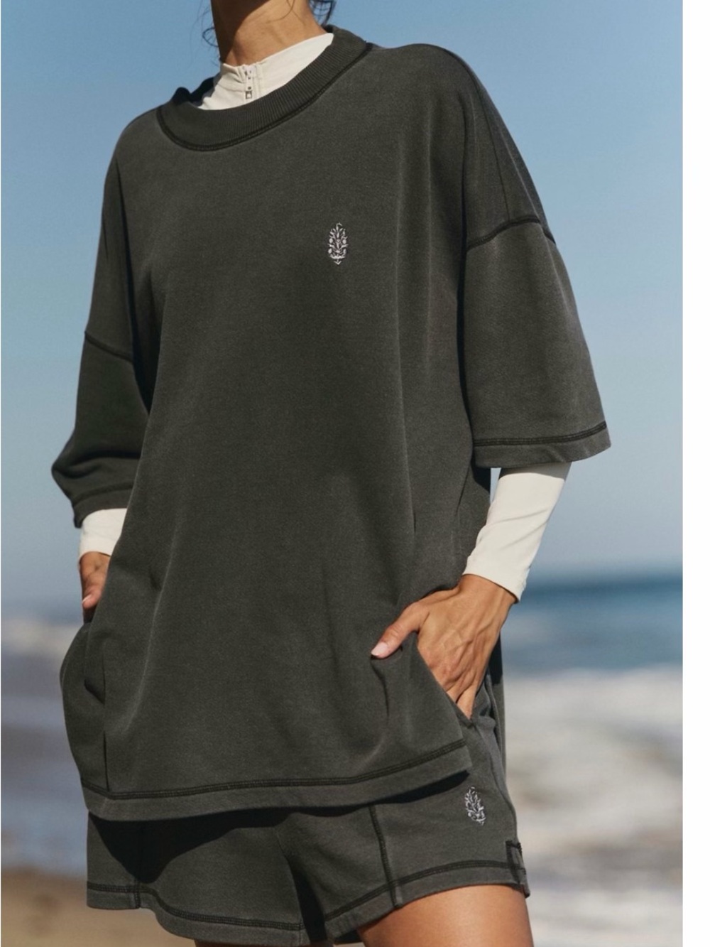 FP Movement Woman's Oversized Tunic shirt with shorts.